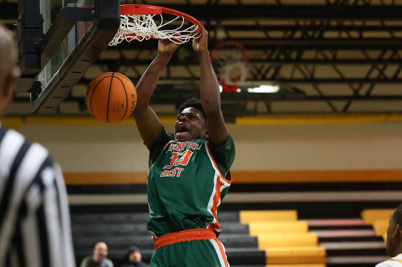 Plainfield East’s Leslie Pobee Jr. throws down a dunk against Joliet West on Friday, Dec. 19, 2025 in Joliet.