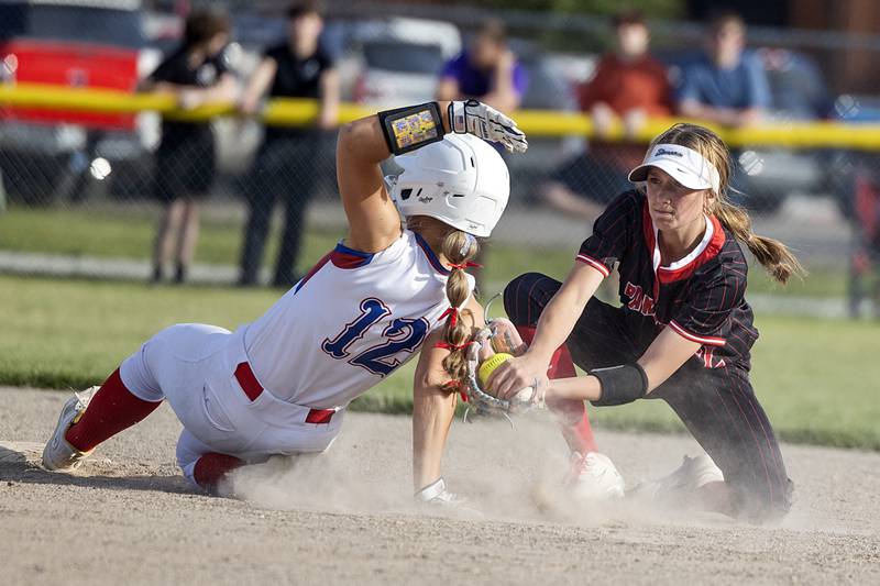 Morrison’s Peyton Lowery slides in safe at second as Erie-Prophetstown’s Laken Renkes goes for the the tag Thursday, May 14, 2026.