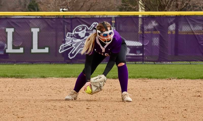 Rochelle's Camryn Metzger scoops up a ball at second and gets the out at first during the Hubs' game with Rockford Boylan.