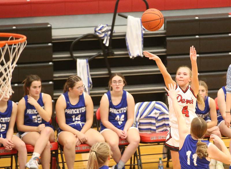 Hall's Charlie Pellegini shoots a three point basket over Princeton's Makayla Hecht on Thursday, Nov. 30, 2023 at Hall High School.