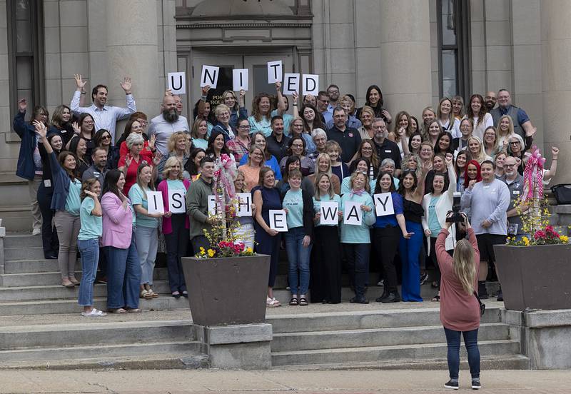 United Way of Lee County board members and supporters pose on the front steps of the Post House Ballroom on Tuesday, May 12, 2026, at the end of the 2025 campaign luncheon.