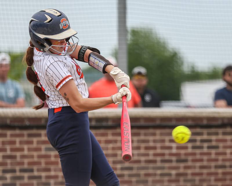 Oswego's Marissa Moffett (5) connects on a pitch during Class 4A Oswego Regional final softball game between Yorkville at Oswego. May 24th, 2024.