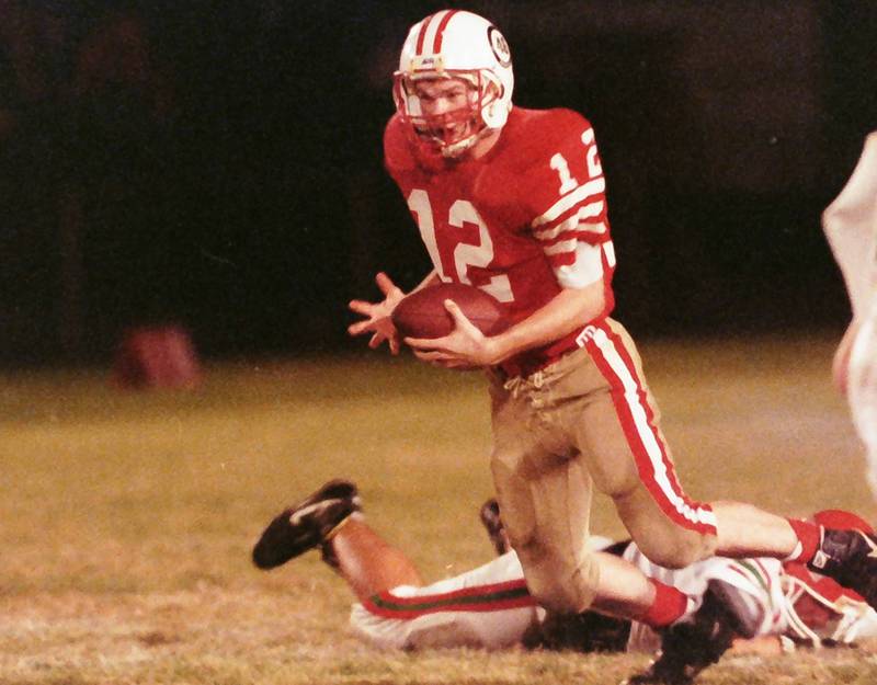 Ottawa's Mike Hollenbeck runs the football against La Salle-Peru on Friday, Oct. 23, 1992 at King Field in Ottawa.