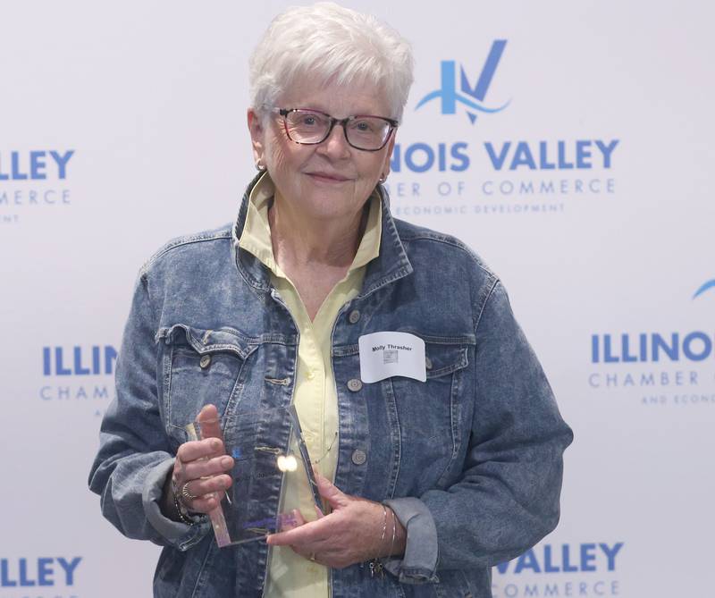 Molly Thrasher poses with her Cornerstone award during the Illinois Valley Chamber of Champions of Change Awards Night on Wednesday, May 6, 2026 at the Westclox Event Center in Peru.