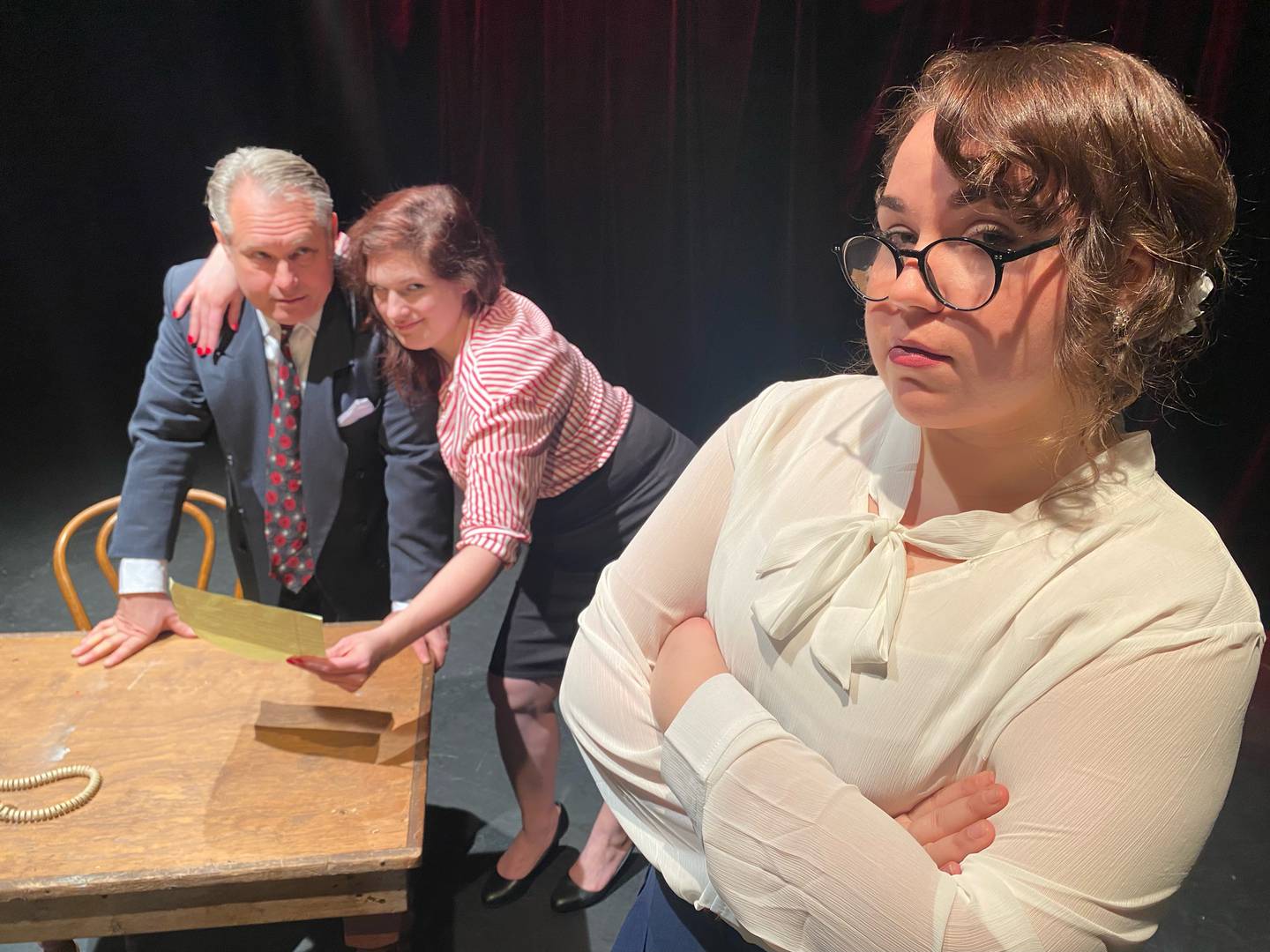 DOA at Steel Beam Theatre - Foreground: Tiffany Jasinski as Paula. Background: Dean Gallagher as Frank Bigelow and Heidi Schultz as Kitty.