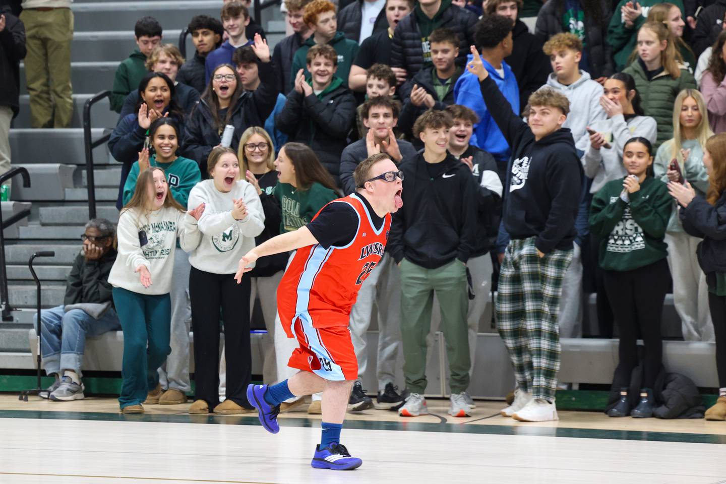 Lincolnway Special Recreation Association player Danny Gengo celebrates scoring a basket against River Valley Special Rec during their game at Bishop McNamara on Friday, Jan. 30, 2026.