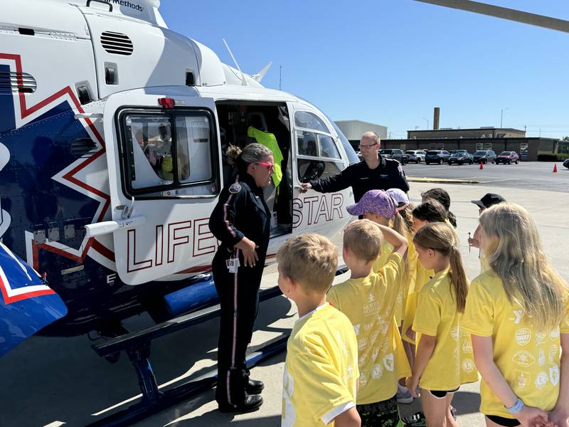 Liesl Esposito explains her job and what it's like to be a nurse on a helicopter to the attendees of Camp 911.