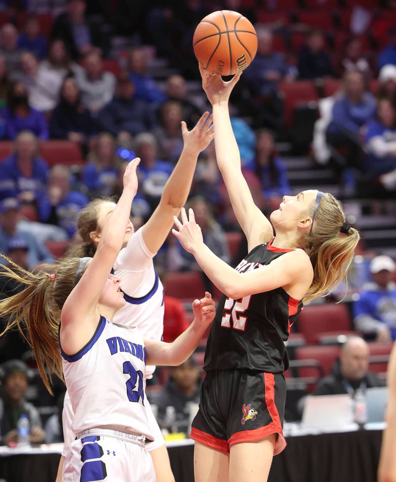 Benet’s Bridget Rifenburg grabs a rebound over Geneva's Caroline Madden during their Class 4A state semifinal game Friday, March 3, 2023, in CEFCU Arena at Illinois State University in Normal.