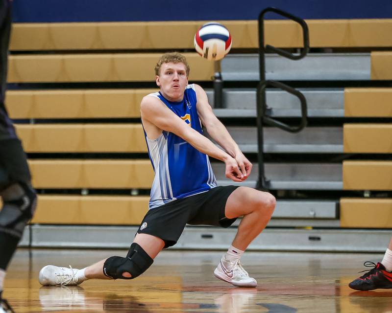 Lyons Sam Levinson (8) with a dig save during Oswego Sectional final between Downers Grove North at Lyons.  May 30, 2023.