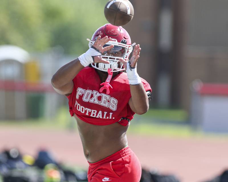 T.J. Harland catches a pass at Yorkville High School football practice, Monday, Aug 13, 2025  in Yorkville.