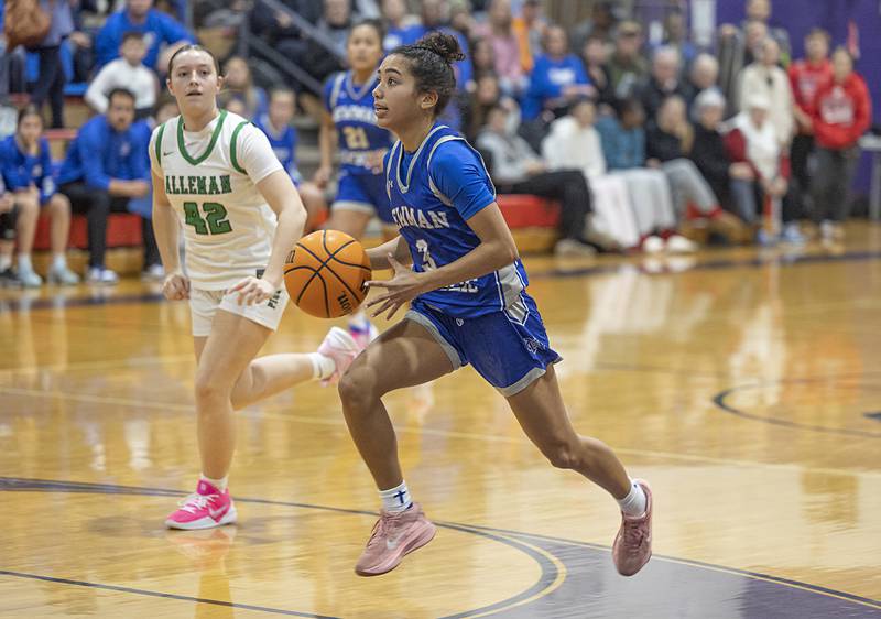 Newman’s Paizlee Williams drives to the hoop against Alleman Friday, Dec. 26, 2025, at the Duchesses Basketball Christmas Classic.
