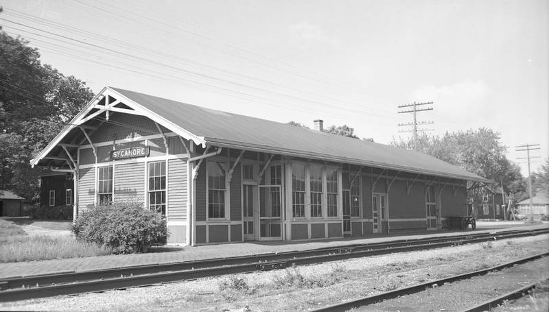 The Chicago Great Western depot looking southwest towards West Page and North Maple streets in Sycamore, circa 1950.