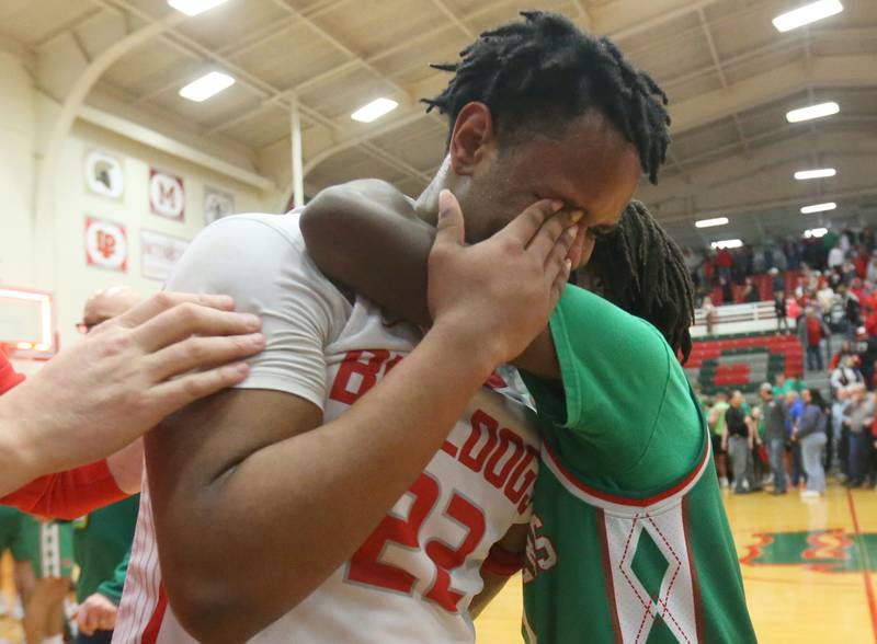 Streator's Tristian Finley is consoled by L-P's Cordell Wheatley after loosing the Class 3A Regional title game on Friday, Feb. 28, 2025 in Sellett Gymnasium at L-P High School.