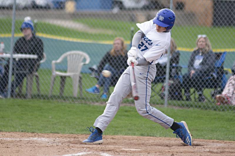 Newman’s Brendan Tunink drives the ball for a double against Princeton Monday, May 2, 2022.