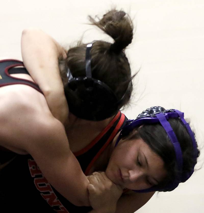 Huntley’s Lilliana Castanon tries to take down Morris’ Nicolette Boleman in the 155-pound match of a nononference wrestling meet on Wednesday, Jan. 22, 2025, at Huntley High School.