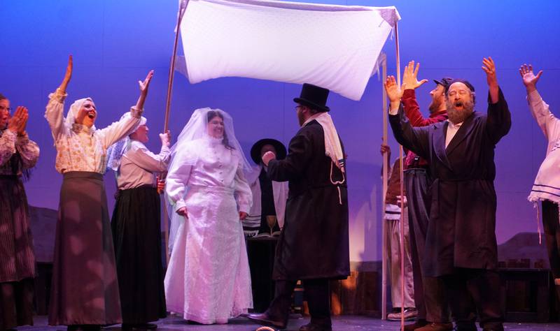 The cast of Music On Stage’s production of “Fiddler on the Roof” performs the wedding scene. Cutting Hall Performing Arts Center in Palatine in 2025.