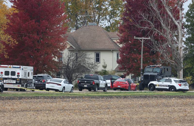 DeKalb County sheriff's deputies and law enforcement authorities investigate the scene of a fatal police shooting on Wednesday, Oct. 23, 2024 on Rich Road just west of Nelson Road in DeKalb Township. A man was shot and killed by police after an hours-long standoff involving a hostage. The man allegedly fired multiple rounds at officers, who returned fire, authorities said.