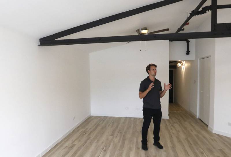 Nick Ieremciuc of Wauconda-based True North Properties shows off an apartment in the Cornell Apartments near downtown Huntley on Tuesday, Sept. 5, 2023. The building was formally the home to the Cornell Brothers Milk Condensing Factory and H.D. Catty.