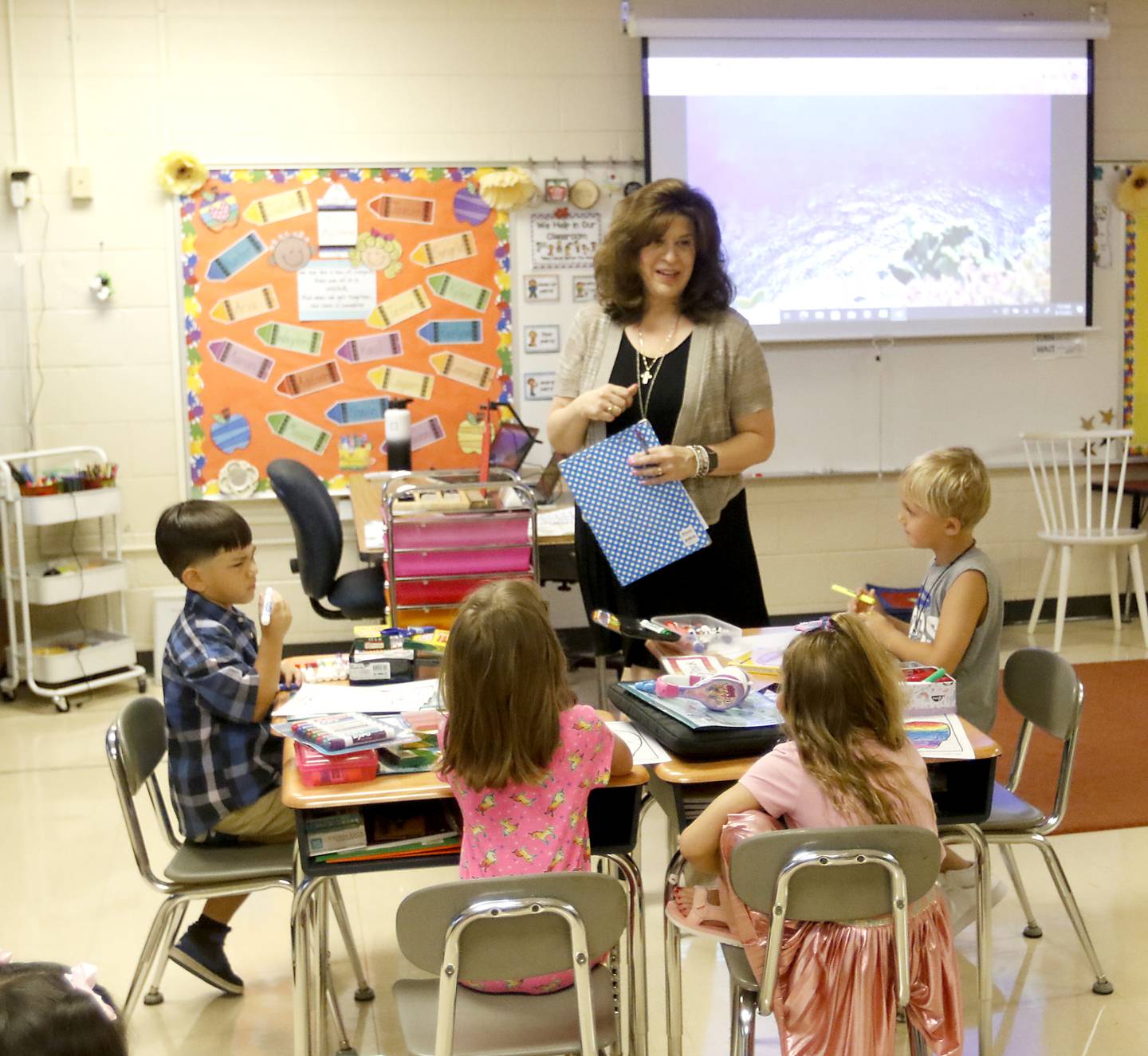 First-grade teacher Regan Maltese teaches her students Monday morning, August 15, 2022, during the first day of school at District 200’s Greenwood Elementary School. Many McHenry County area schools return to session this week.