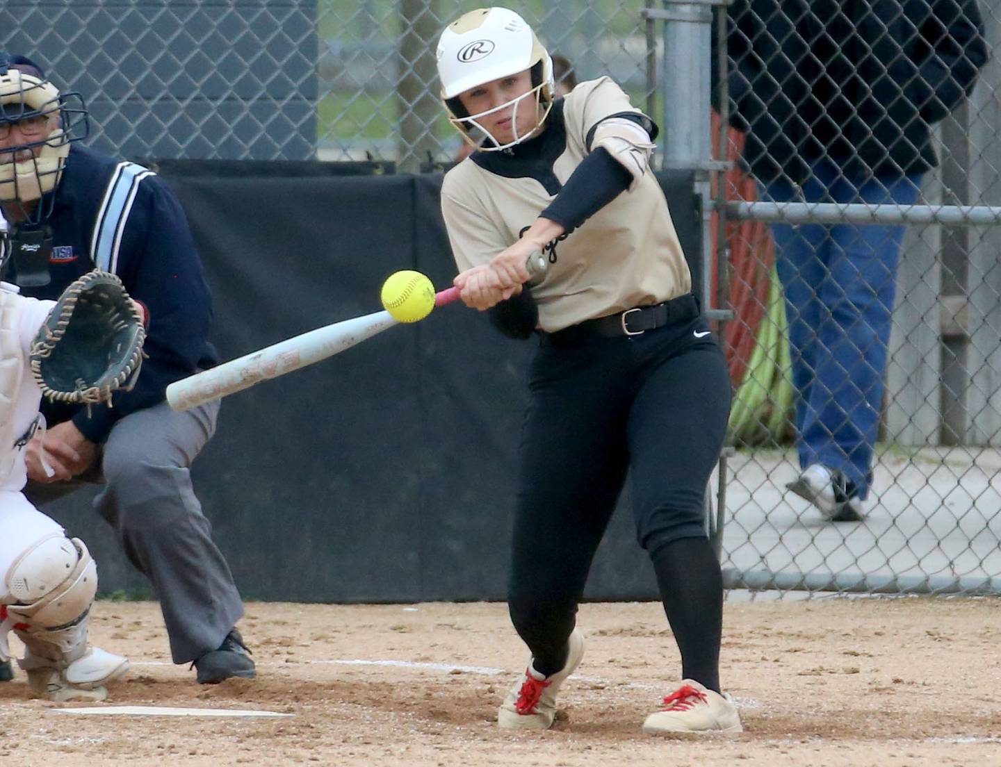 Sycamore's Faith Heil makes contact with the ball against Ottawa on Tuesday, May 5, 2026 at Peck Park in Ottawa.
