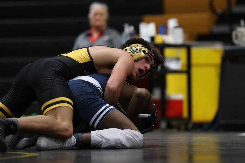 Joliet West’s Cash Ocampo looks at the clock against Plainfield South’s Quan Hamilton in the 113 pound match on Wednesday, Dec. 3, 2025 in Joliet.