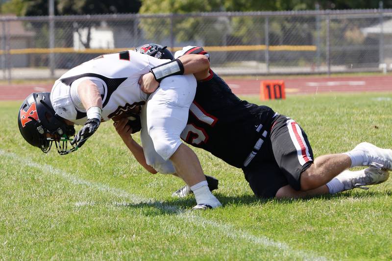 Erie-Prophetstown’s #51 Derek Naftzger stops Boilermakers #30 Ace LaFollette Saturday, Aug. 30, 2025, in Prophetstown. The hosting EP team came out victorious for the season opener against Kewanee 29-6.