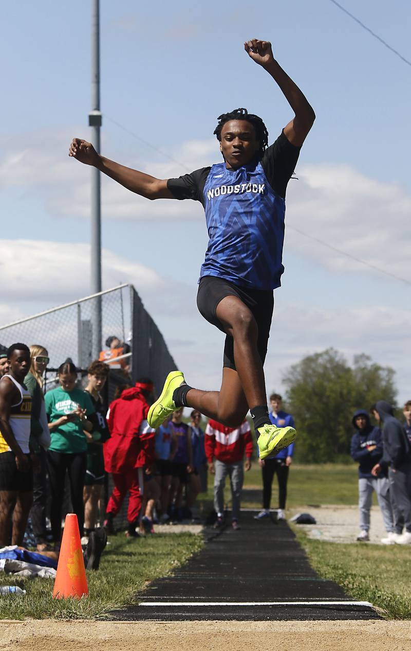 Woodstock's Marc Thomas competes in the long jump during the IHSA Class 2A Richmond-Burton Sectional Boys Track and Field Meet on Wednesday, May 20, 2026, at Richmond-Burton High School.