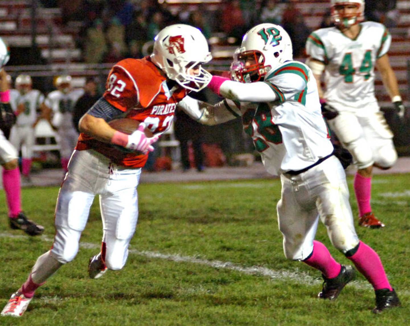 Ottawa senior receiver Cody Stokes fights for downfield yardage after a reception in the second quarter Friday night against La Salle-Peru.