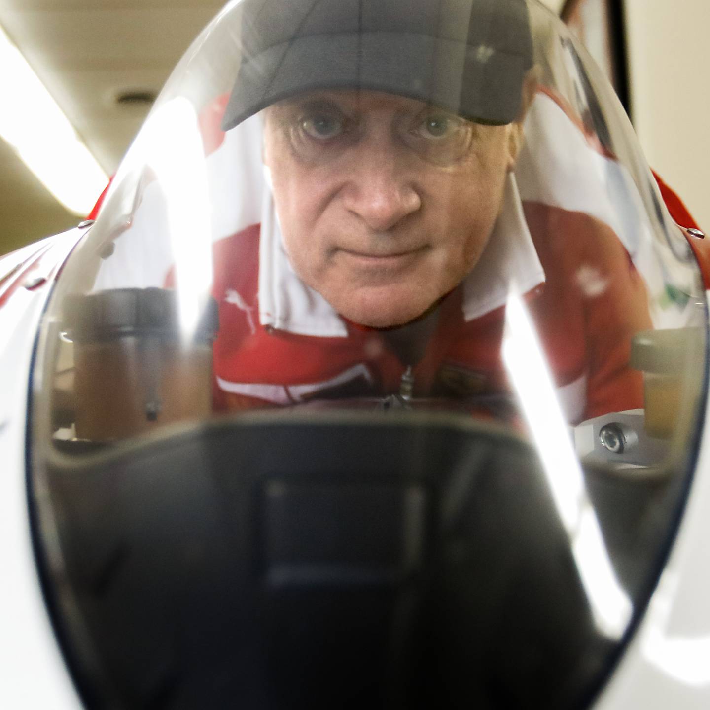 Jeff Schwartz on his Ducati motorcycle on Tuesday, Dec. 27, 2022, at his garage in McCullom Lake. He set numerous land speed records last year with his motorcycle and Ferrari.