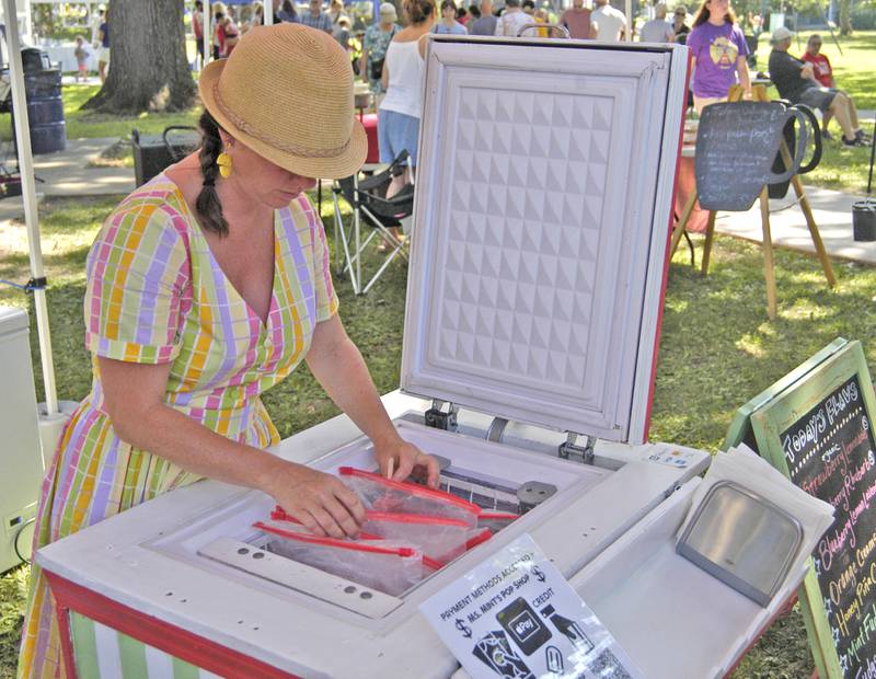 Kate Gross serves up popsicles at Nuts About Art on Saturday, July 5, 2025, at the 61st annual Dixon Petunia Fest.
