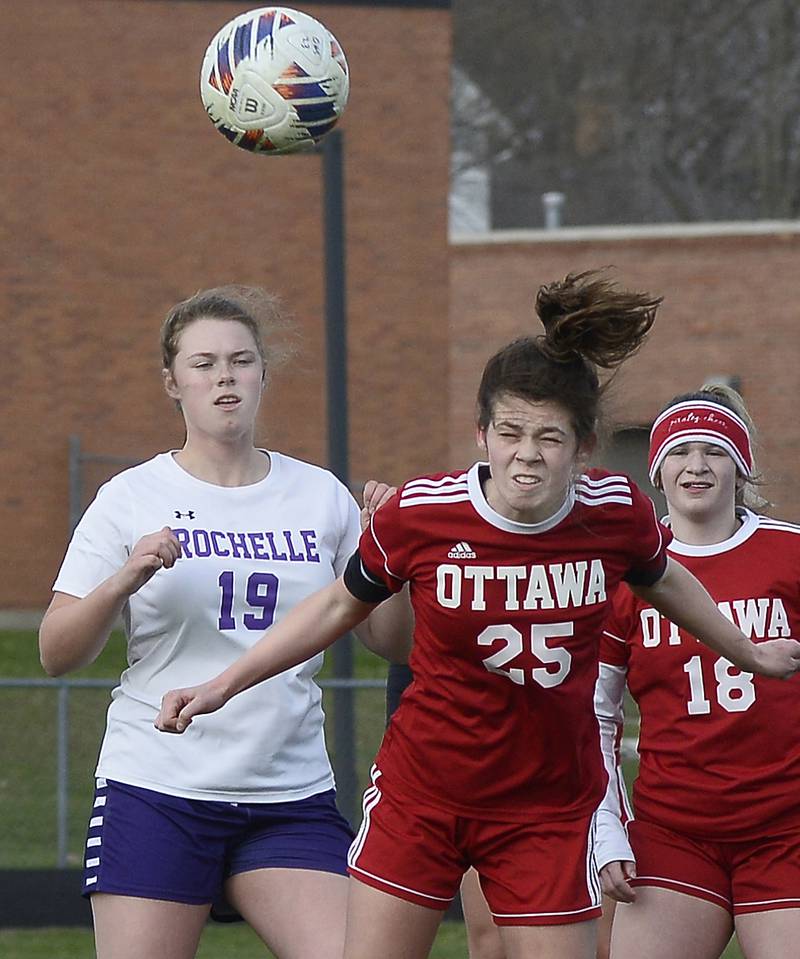 Ottawa Morgan Clements gets to the ball for a header ahead of Rochelle’s Sydney Thorne in the first half during a match on Wednesday, April 5, 2023 at King Field in Ottawa.