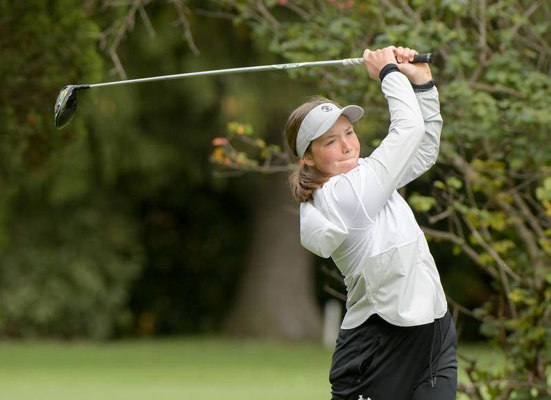 Ottawa's Zoe Harris drives from the second tee during the Interstate Eight Conference Girls Golf Meet at Sycamore Golf Club on Tuesday.