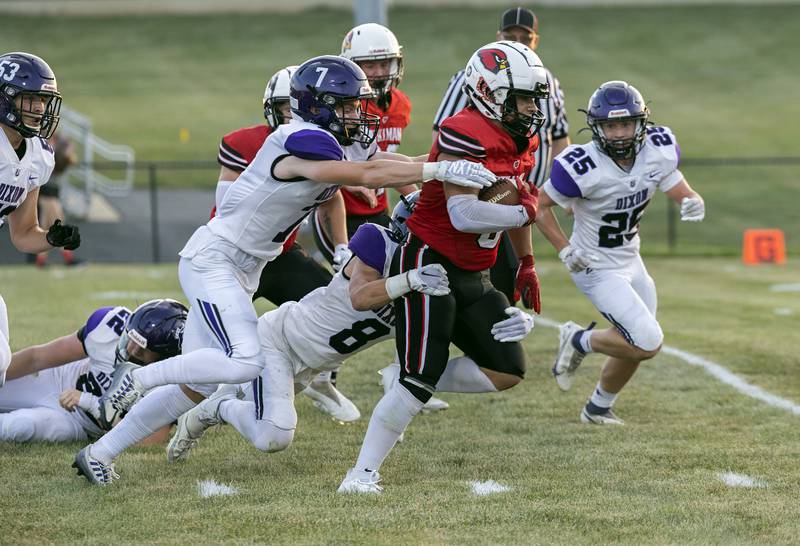 Stillman’s Isaiah Herebia is chased down by Dixon’s Cort Jacobson (7) Friday, August 25, 2023.