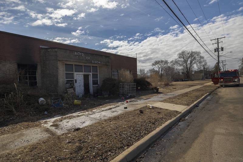 Dixon City firefighters work to extinguish hot spots in the afternoon on Monday, March 2, 2026, after previously fighting a fire in the 1100 block of West First Street. Dixon City responded to the fire at 2:21 a.m. and cleared the scene at 6:19 a.m.