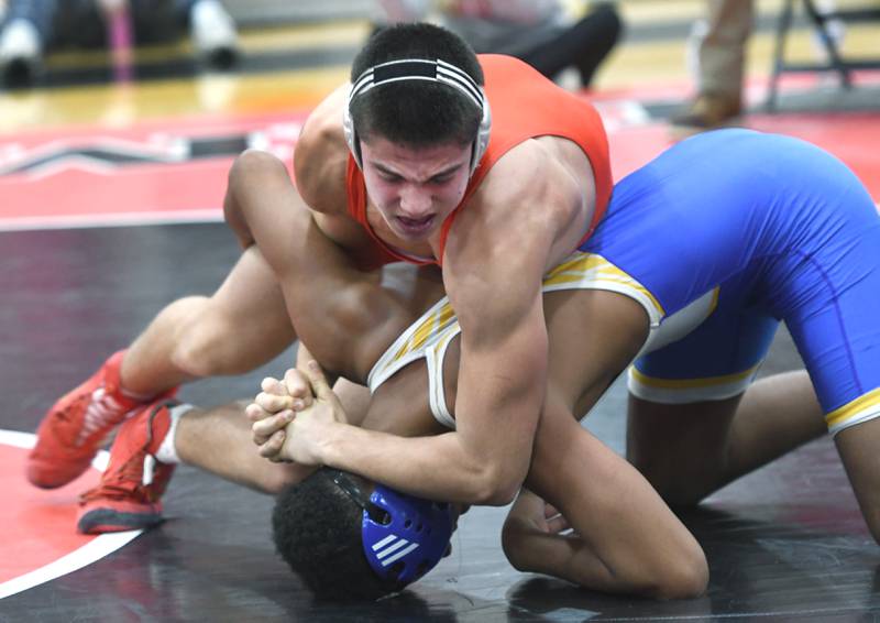 Oregon's Cole Suter holds Johnsburg's Jordan Sylvanus during their 165-pound match at the Stillman Valley Holiday Tournament on Saturday, Dec. 20, 2025 at Stillman Valley High School.