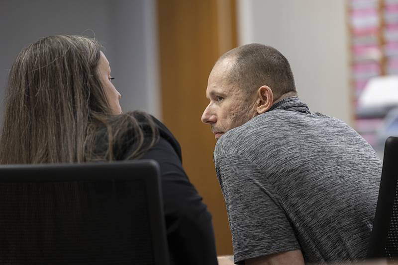 Steven W. Coleman speaks with attorney Dana McCormick Thursday, July 18, 2024 at his Whiteside County trial.