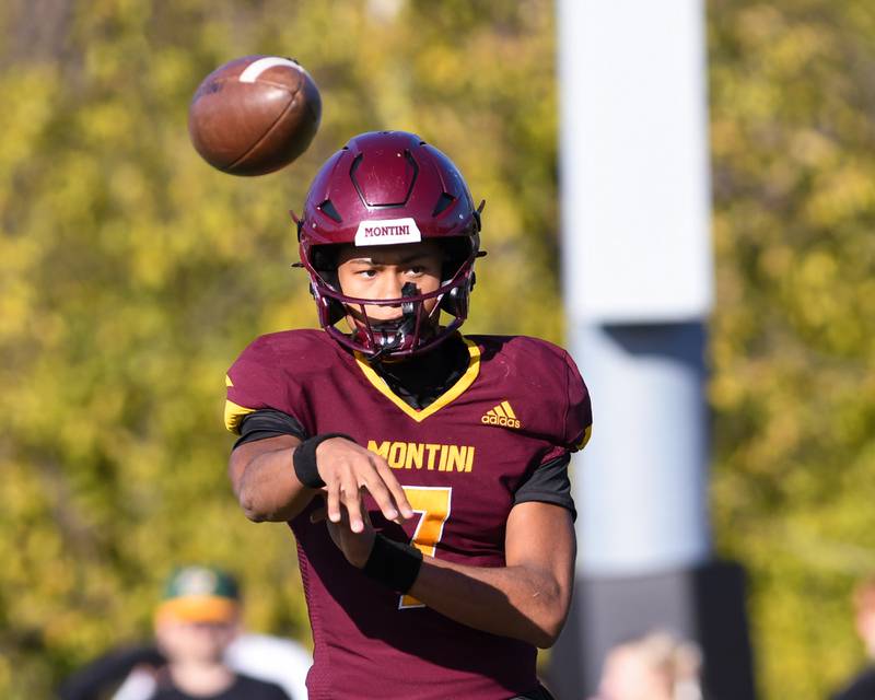 Montini Catholic's Israel Abrams (7) passes the ball during the 4A quarterfinals game on Saturday Nov. 15, 2025; while taking on Coal City held at Montini Catholic High School.