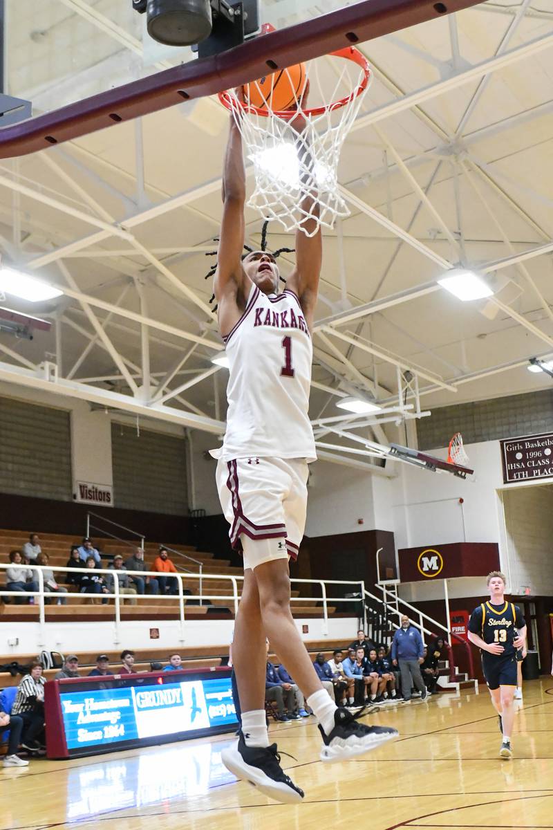 Kankakee's Lincoln Williams dunks the ball during the Kays' 85-50 victory over Sterling in the IHSA Class 3A Morris Regional championship on Friday, Feb. 28.