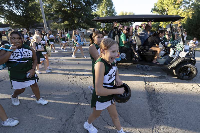 Young cheer squad members march through the Rock Falls homecoming parade Thursday, Sept. 25, 2025.