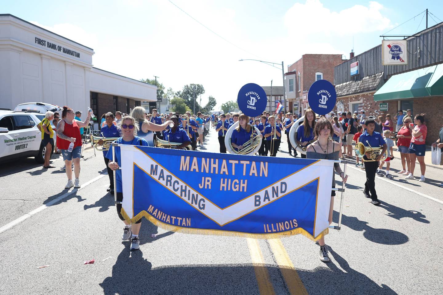 Members of the Manhattan Jr High Marching Band walk along in the Manhattan Labor Day Parade on Monday, Sept. 4, 2023 in Manhattan.