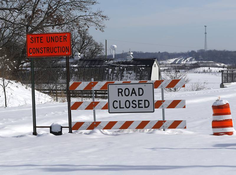 The new Longmeadow Parkway bridge over the Fox River connecting Algonquin to Carpentersville is expected to open in 2024. Signs around the construction area are seen on  Jan. 18, 2024.