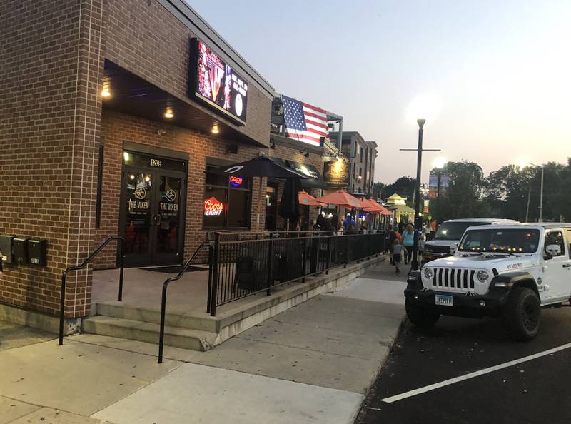 McHenry's Green Street near the Riverwalk on Friday, Sept. 29, 2023. The city council heard a proposal on Monday that, if approved, would allow residents to walk from restaurants, bars and shops, and on the Riverwalk and in parks, with open containers of alcohol.