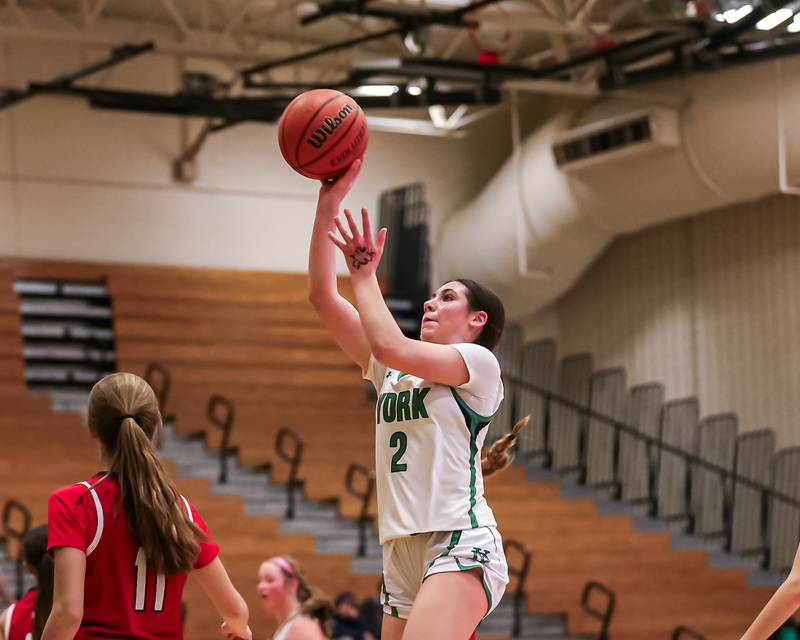 York's Anna Filosa (2) puts up a floater for two points during basketball game between Hinsdale Central at York. Dec 8, 2023.