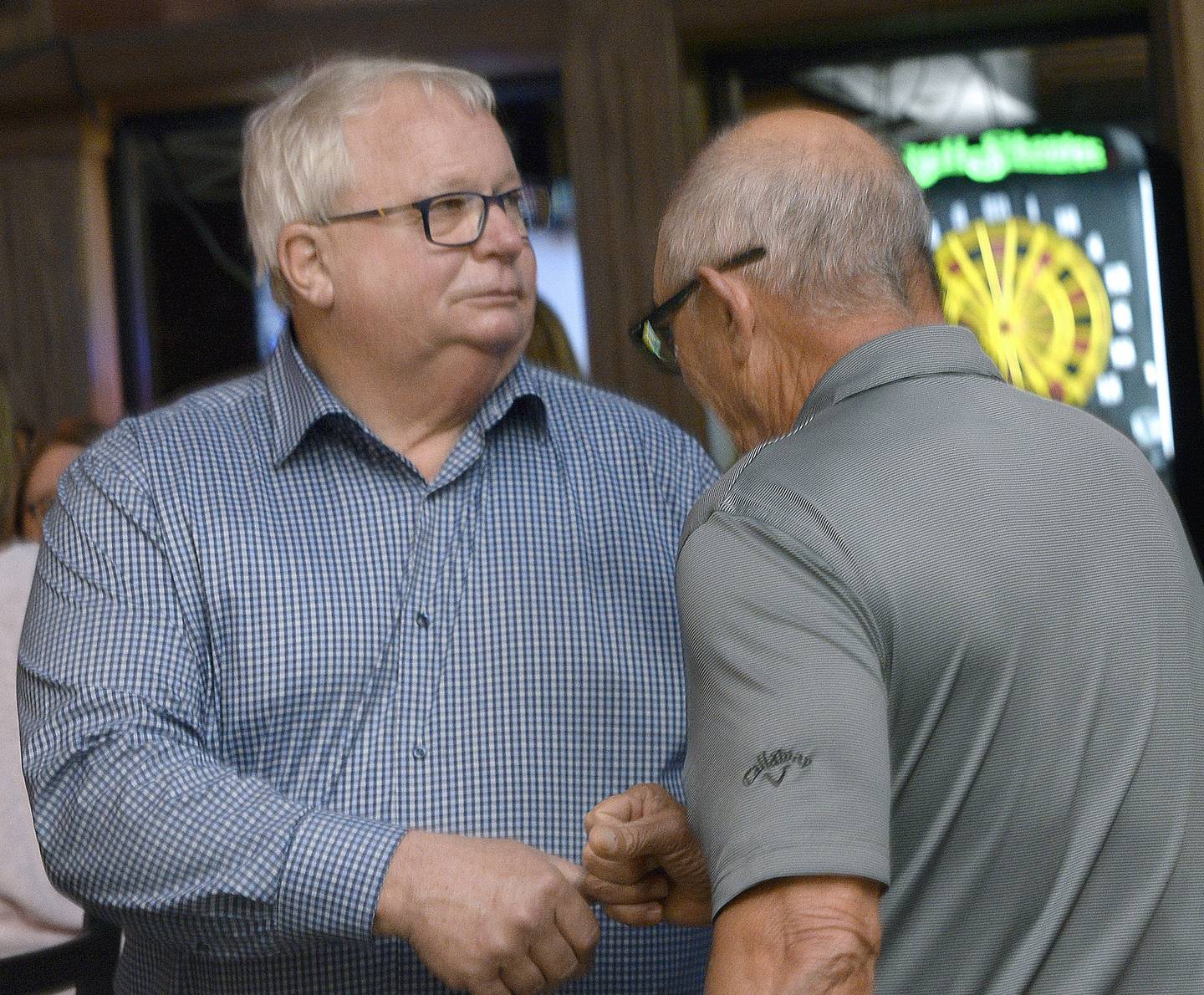 Ottawa Mayor Dan Aussem greets a supporter on Tuesday, April 4, 2023 at J.J.’s Pub in Ottawa.