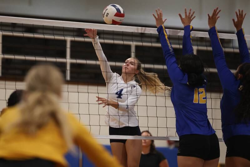 Plainfield South’s Sophia Pellegrini smack over a shot against Joliet Central on Thursday, Sept. 7, 2023vin Joliet.