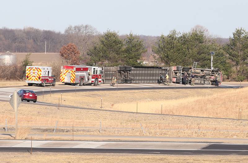 La Salle firefighters and EMS work the scene of a semi rollover on the west on ramp to Interstate 39 on Friday, Dec. 2, 2022 near La Salle. La Salle and Utica fire and EMS were dispatched to the scene. The incident happened shortly before 9:30a.m.