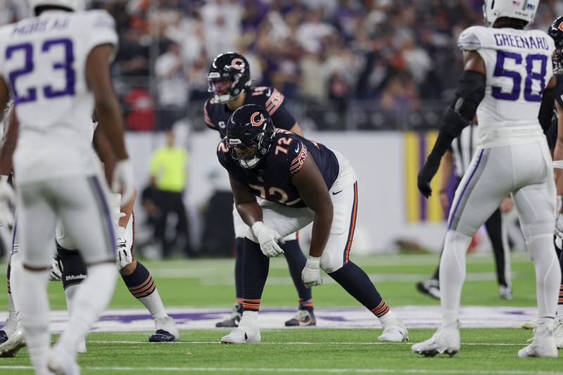 Chicago Bears offensive tackle Kiran Amegadjie (72) lines up for a play against the Minnesota Vikings during the first half of an NFL football game Monday, Dec. 16, 2024 in Minneapolis. Minnesota won 30-12. (AP Photo/Stacy Bengs)
