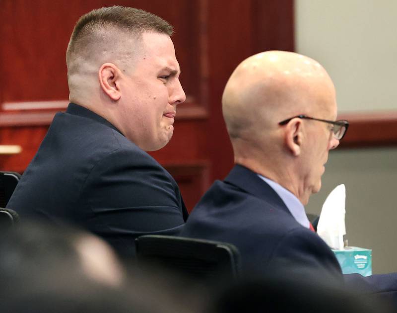 Former police officer James Corralejo (left) becomes emotional while listening to victim impact statements with his attorney Gary Johnson Thursday, July 17, 2025, at the DeKalb County Courthouse in Sycamore. Corralejo was sentenced to four years in prison for a Class 2 felony count of driving under the influence of alcohol causing death for a 2023 crash that killed DeKalb woman Graciela Reza Contreras.
