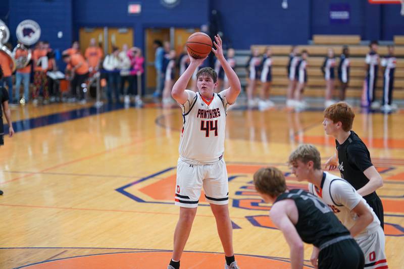 Oswego’s Hunter O’Neill (44) shoots a free throw during a basketball game against Oswego East at Oswego High School on Tuesday, Dec 12, 2023.