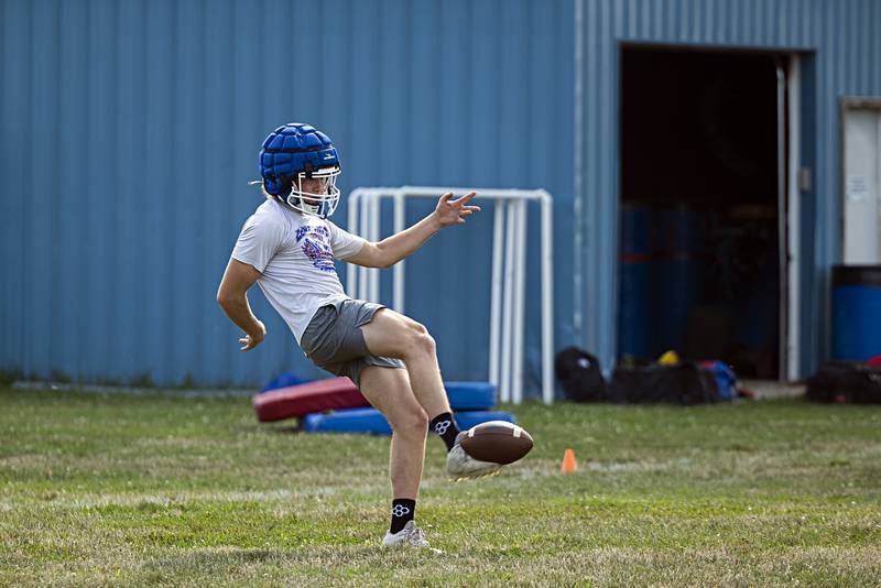 Newman players run through drills during first day of football practice Monday, August 7, 2023.